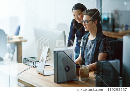 Creative, advice and women at computer together in office for planning, email and business development. Teamwork, partnership and people in meeting for design idea with support, help or mentorship 119293267