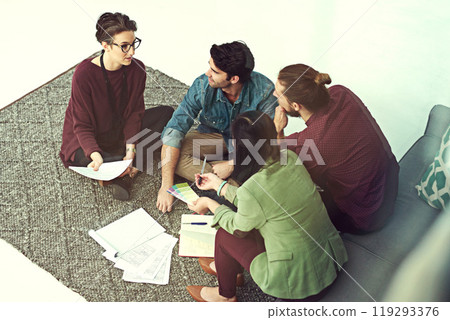 Floor, workshop and business people in creative brainstorming, collaboration or ideas at startup. Growth, development and teamwork at meeting for design, planning and problem solving on office carpet 119293376