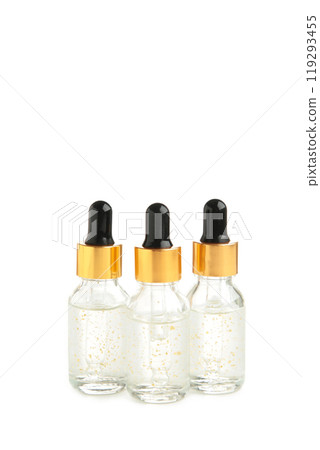 A glass bottles with a pipette with oil, serum isolated on white background with copy space. 119293455