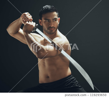 Martial arts, man and sword for training, skill and self defense on dark studio background. Person, model and fighter with challenge, talent and practice with exercise, attack and weapon with balance 119293650