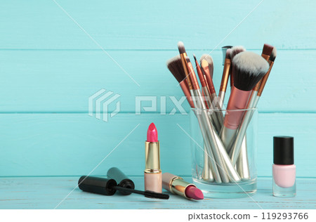Set of make-up products on blue background. Set of make-up products on blue background. 119293766