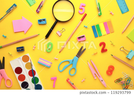 School supplies on yellow background. Back to school concept. School supplies on yellow background. Back to school concept. 119293799