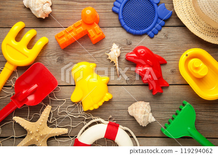 Summer beach toys on grey wooden background 119294062