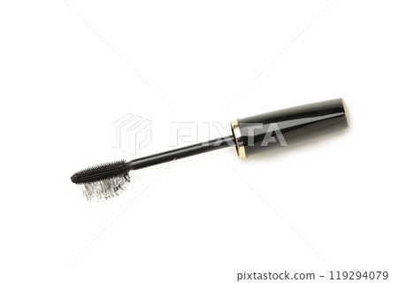 Stroke of black mascara with applicator brush close-up, isolated on white background 119294079