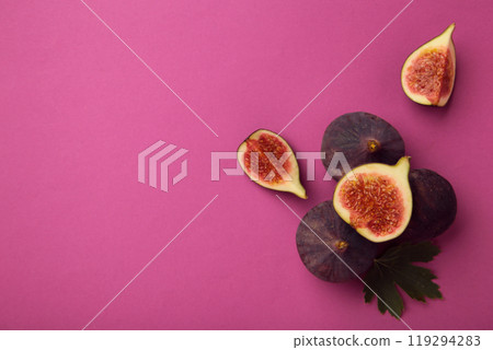Fresh ripe figs on pink background. Tropical fruit 119294283