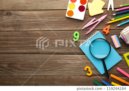 School supplies on grey wooden background with copy space. Back to school concept. 119294284