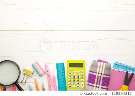 School supplies on white background with copy space. Back to school concept. School supplies on white background with copy space. Back to school concept. 119294312