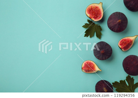 Fresh ripe figs on blue background. Tropical fruit 119294356