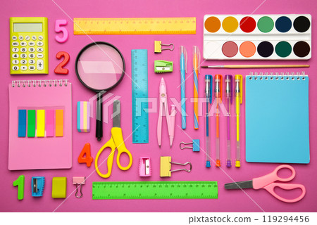 School supplies on pink background. Back to school concept. School supplies on pink background. Back to school concept. 119294456