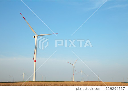 Windmills for electric power production on a sunny day Windmills for electric power production on a sunny day 119294537