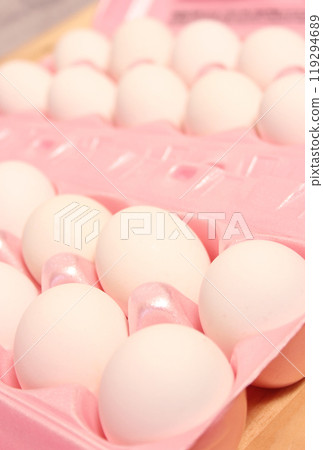 Carton of Fresh Chicken Eggs Close up on Table Carton of Fresh Chicken Eggs Close up on Table 119294689