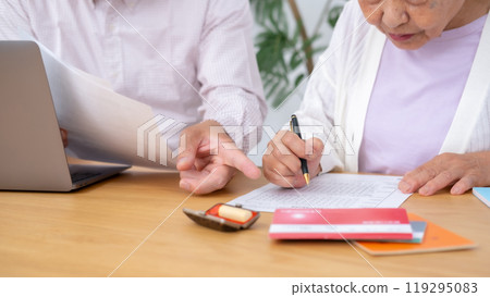 Parent and child end of life planning: mother, son 119295083