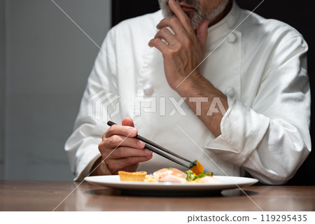 Chef plating appetizers 119295435