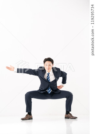 Businessman stomping his feet 119295734