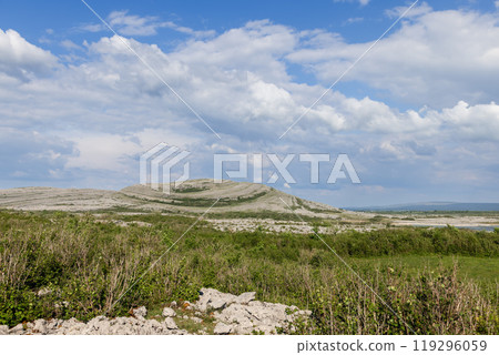 Scenic view of Burren Park with rugged limestone formations and vast open skies Scenic view of Burren Park with rugged limestone formations and vast open skies 119296059
