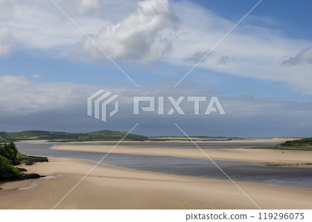 Vast sandy banks appear as the Gweebarra River meets the Atlantic Ocean at low tide in summer Vast sandy banks appear as the Gweebarra River meets the Atlantic Ocean at low tide in summer 119296075