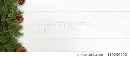 Christmas wooden background with fir tree frame and cone copy space. top view empty space for your design 119296590