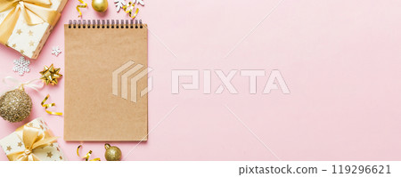 Christmas blank greeting card mock-up scene. Creative layout made of Christmas tree branches and paper card note. Flat lay. Nature New Year concept Christmas blank greeting card mock-up scene. Creative layout made of Christmas tree branches and paper card note. Flat lay. Nature New Year concept 119296621