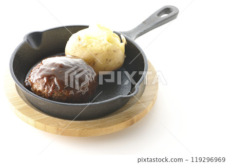 Hamburg steak and buttered potatoes photographed on a white background 119296969