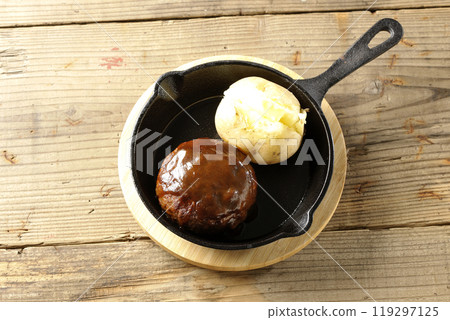 Hamburger steak and buttered potatoes 119297125