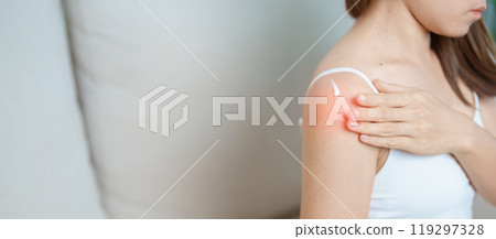 Arthritis and Muscle Pain Relief Cream concept. Woman having Shoulder and Arm pain at home. Muscle painful due to Myofascial pain syndrome and Fibromyalgia, rheumatism, Scapular pain, Cervical Spine 119297328