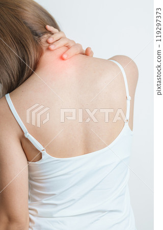 Woman having Neck and Shoulder pain at home. Muscle painful due to Myofascial pain syndrome and Fibromyalgia, rheumatism, Scapular pain, Cervical Spine. ergonomic concept 119297373