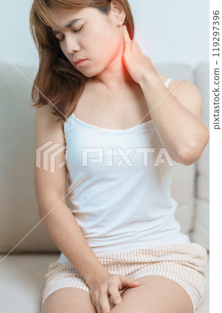 Woman having Neck and Shoulder pain at home. Muscle painful due to Myofascial pain syndrome and Fibromyalgia, rheumatism, Scapular pain, Cervical Spine. ergonomic concept Woman having Neck and Shoulder pain at home. Muscle painful due to Myofascial pain syndrome and Fibromyalgia, rheumatism, Scapular pain, Cervical Spine. ergonomic concept 119297396