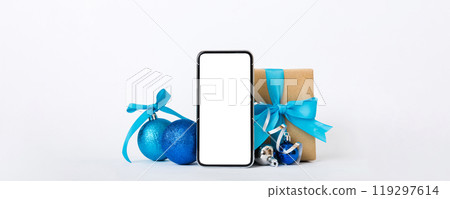 Digital phone mock up with rustic Christmas decorations for app presentation with empty space for you design. Christmas online shopping concept. Tablet with copy space on colored background 119297614