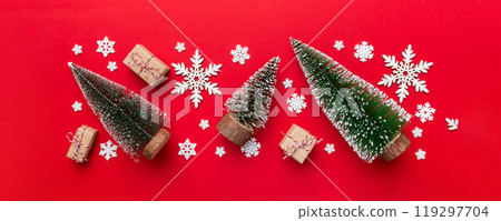 Flat lay composition with christmas trees on color background. Top view with copy space 119297704