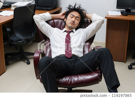 Male employee sleeping on a chair inside the office. Male employee sleeping on a chair inside the office. 119297865