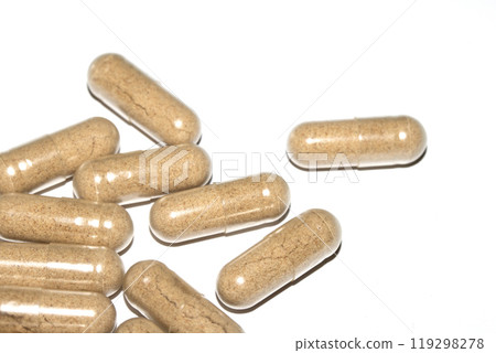 Vitamin Capsules and Pills on a White Background For Medication round and long shaped 119298278