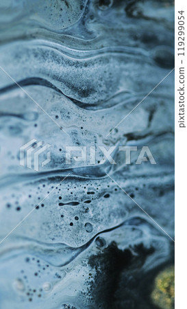 Oil paint spill. Glitter ink mix. Defocused blue black color shiny particles marble texture emulsion flow abstract background. 119299054