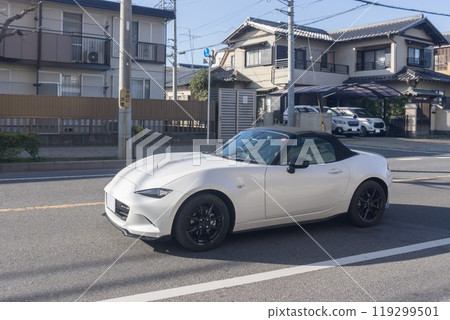 Sports car driving on the road Sports car driving on the road 119299501