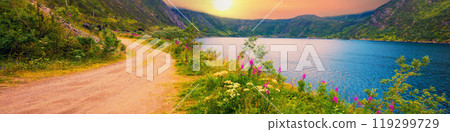 Mountain dirt road along the fjord. Nature of Norway. Horizontal banner Mountain dirt road along the fjord. Nature of Norway. Horizontal banner 119299729