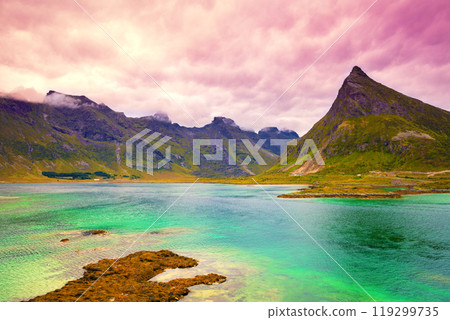 Panoramic view of the fjord and beautiful mountains at sunset. Fredvang, Volandstind, Lofoten Islands, Norway 119299735