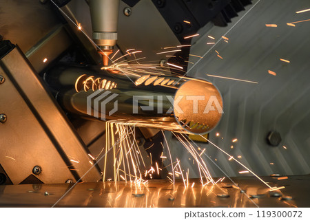 Close up scene the fiber laser cutting machine cut the stainless steel tube and sparkling light. Close up scene the fiber laser cutting machine cut the stainless steel tube and sparkling light. 119300072