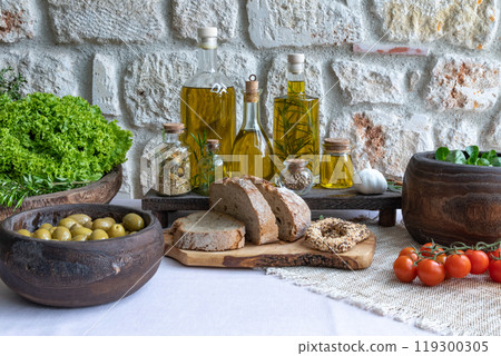 organic whole grain bread on a cutting board 119300305