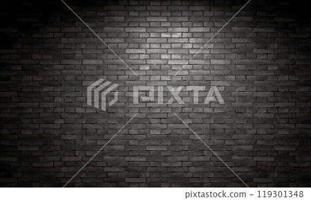 Spotlight shining on a black brick wall background 119301348