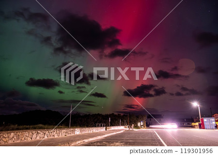 The Aurora Borealis, the northern lights, showing up in Portnoo, County Donegal, Ireland. The Aurora Borealis, the northern lights, showing up in Portnoo, County Donegal, Ireland. 119301956