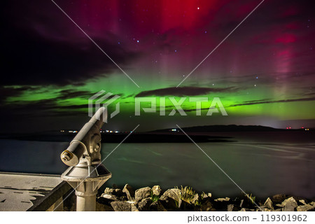 The Aurora Borealis, the northern lights, showing up in Portnoo, County Donegal, Ireland. The Aurora Borealis, the northern lights, showing up in Portnoo, County Donegal, Ireland. 119301962