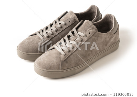 Pair of new male gray nubuck leather sneakers or sport shoes isolated on white background. Close up. Pair of new male gray nubuck leather sneakers or sport shoes isolated on white background. Close up. 119303053