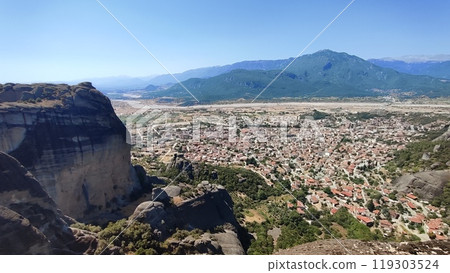 A city in a beautiful valley, surrounded by mountains A city in a beautiful valley, surrounded by mountains 119303524