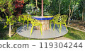 Wooden table in garden 119304244