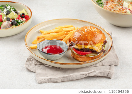 Portion of burger with french potato fries Portion of burger with french potato fries 119304266
