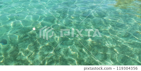 Azure Aegean sea view. Vourvourou village, Diaporos island. North Greece 119304356