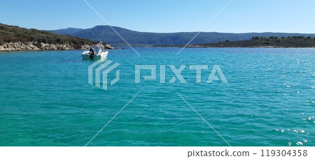 Azure Aegean sea view. Vourvourou village, Diaporos island. North Greece 119304358