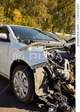Severe Car Crash Damage Completely Wrecked Vehicles After a Major Collision Incident 119305205
