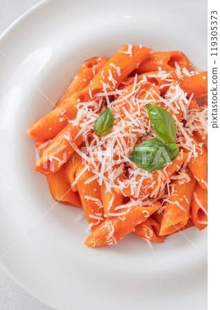 Pasta with bell pepper sauce 119305373