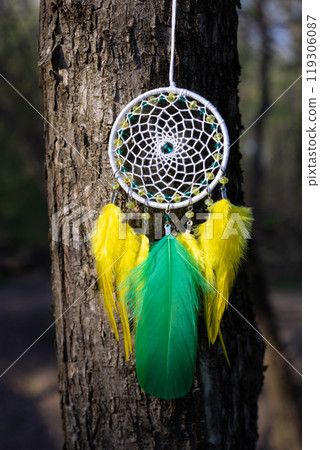 Handmade dream catcher with feathers threads and beads rope hanging Handmade dream catcher with feathers threads and beads rope hanging 119306087