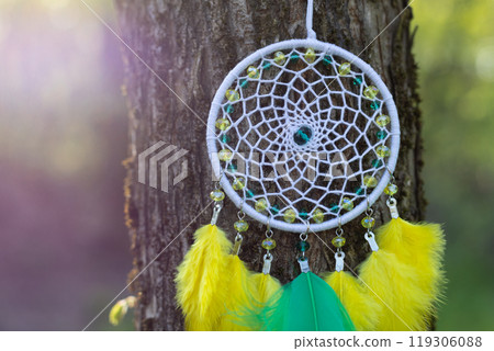 Handmade dream catcher with feathers threads and beads rope hanging Handmade dream catcher with feathers threads and beads rope hanging 119306088